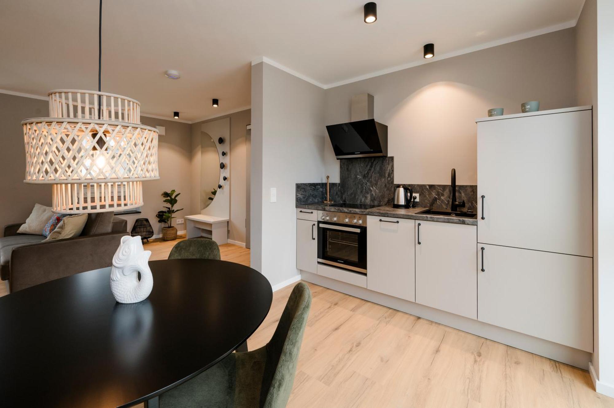 Apartments By Altes Zollamt هوسوم المظهر الخارجي الصورة